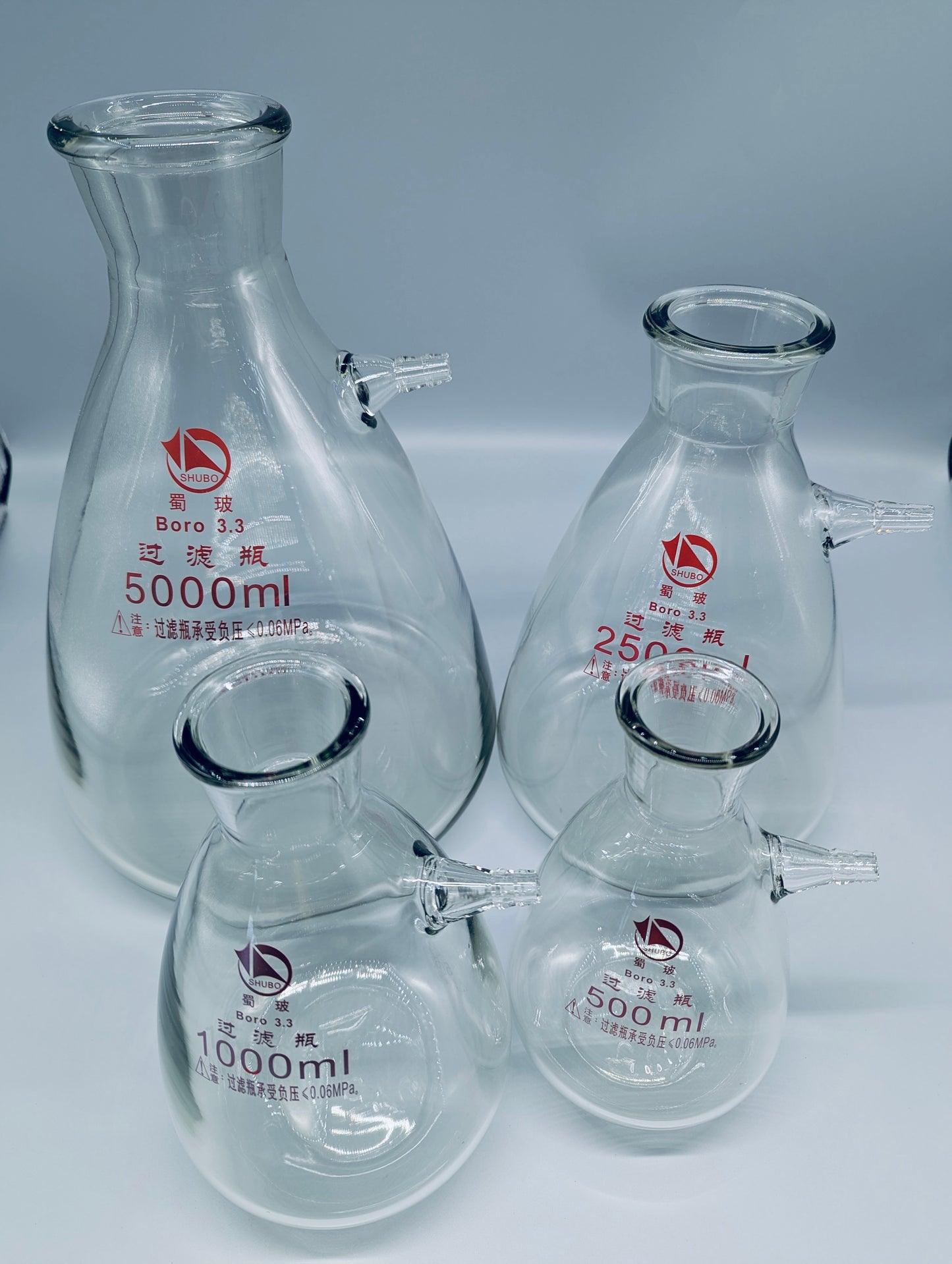 Vacuum filtration flasks, with tubulation